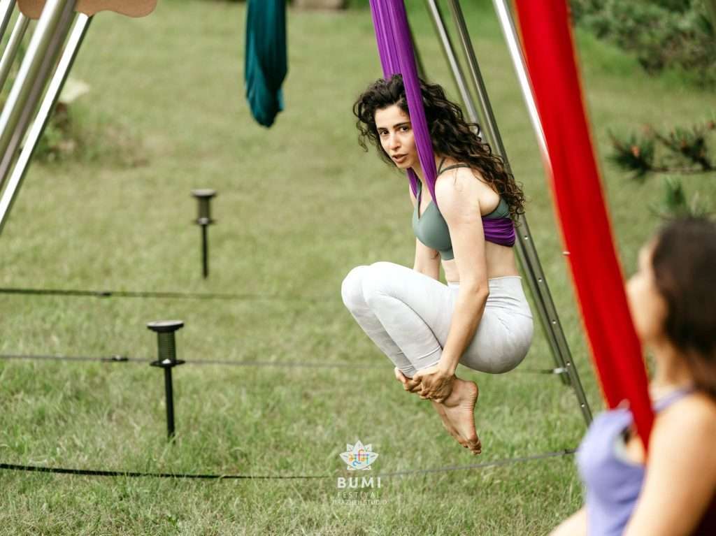 Bumi Festival 2024 Linda Aerial Yoga Instructor Guides participants in yoga that defies gravity.