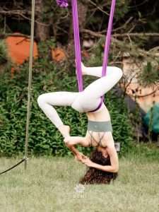 Bumi Festival 2024 Linda Aerial Yoga Instructor Guides participants in yoga that defies gravity.