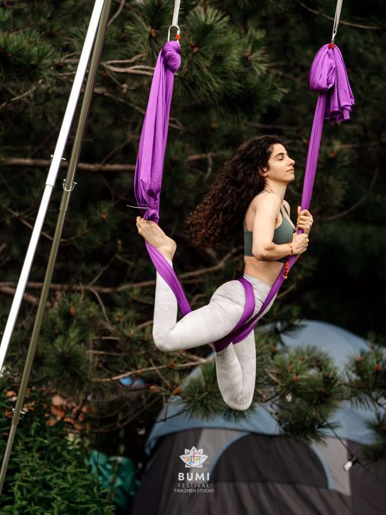 Bumi Festival 2024 Linda Aerial Yoga Instructor Guides participants in yoga that defies gravity.