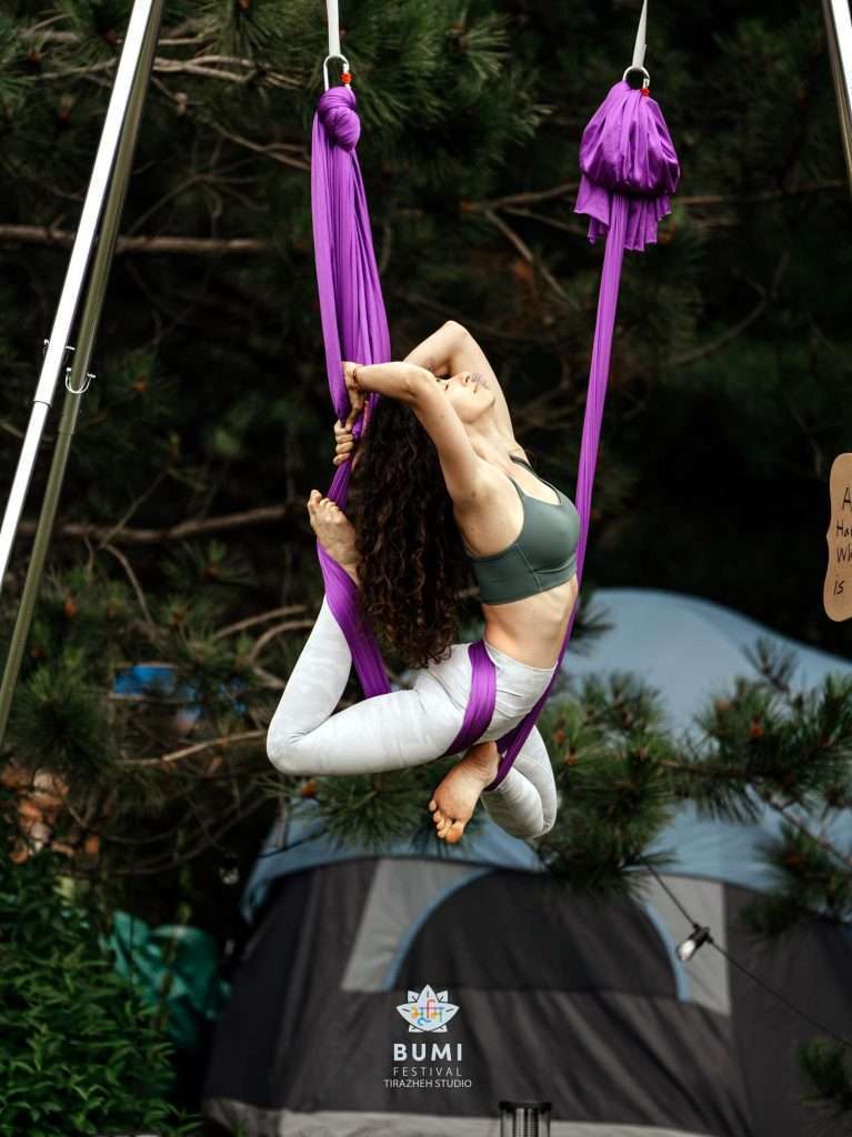 Bumi Festival 2024 Linda Aerial Yoga Instructor Guides participants in yoga that defies gravity.