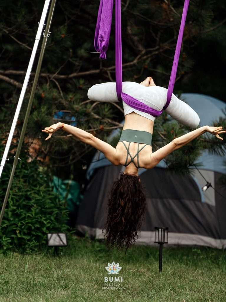 Bumi Festival 2024 Linda Aerial Yoga Instructor Guides participants in yoga that defies gravity.
