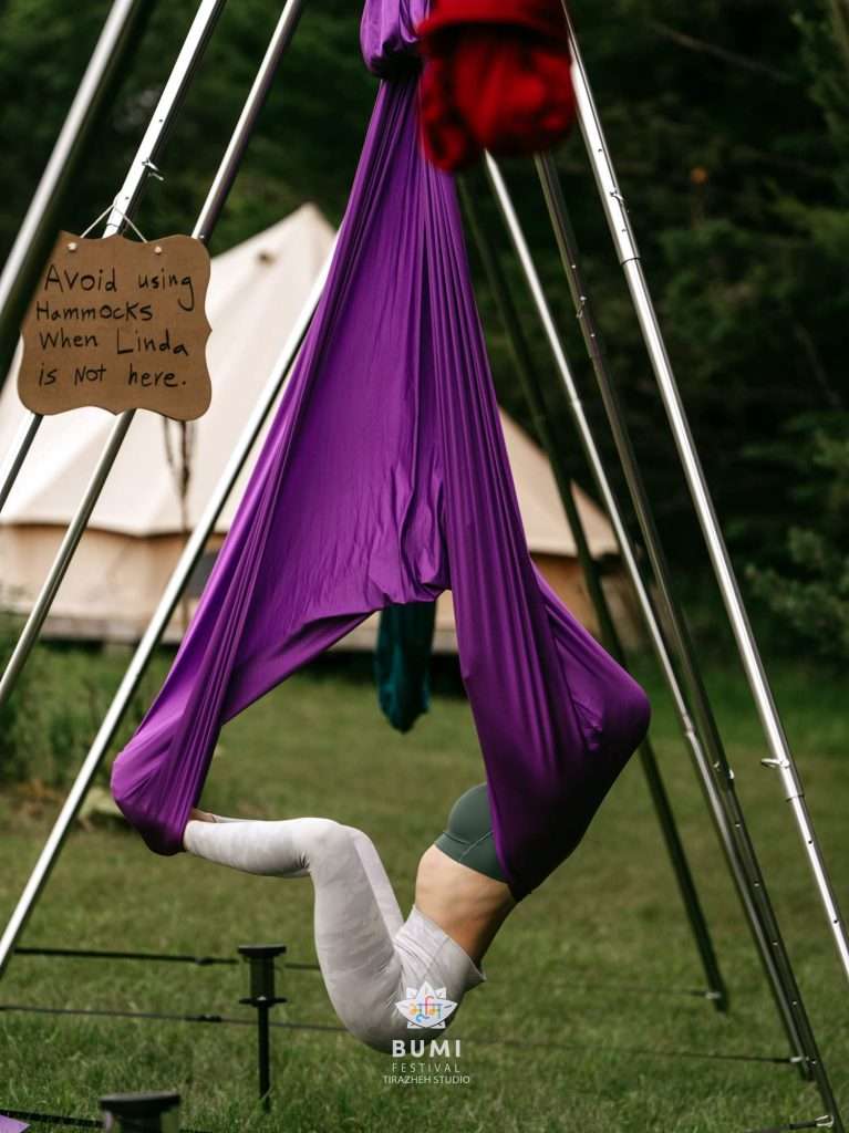Bumi Festival 2024 Linda Aerial Yoga Instructor Guides participants in yoga that defies gravity.